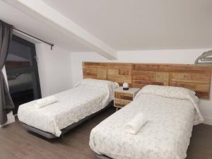 Postel nebo postele na pokoji v ubytování VILLA MAREL