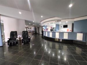 The fitness centre and/or fitness facilities at Manacá Hotel
