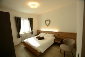 Een bed of bedden in een kamer bij Appartamento Gavazza