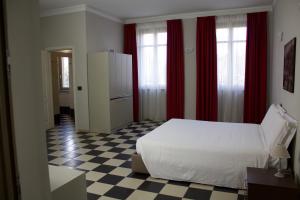 Postel nebo postele na pokoji v ubytování Cascina Marchesa