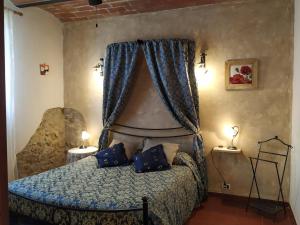 Säng eller sängar i ett rum på Agriturismo Vernianello