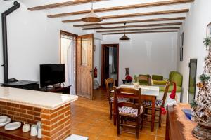 A seating area at El Molinet del Governador- Apartamentos Rurales