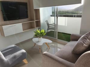 Posezení v ubytování Excelente Apartamento Completo, en la mejor zona