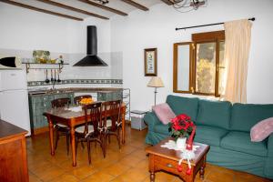 A seating area at El Molinet del Governador- Apartamentos Rurales
