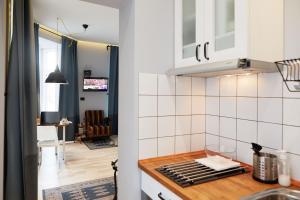 Una cocina o zona de cocina en Courthouse Apartments Slavi