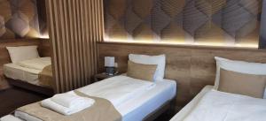 Postel nebo postele na pokoji v ubytování Student Hotel Mostar