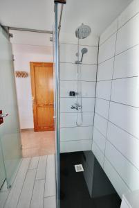 a shower with a glass door in a bathroom at Atlantic Sea in Gran Tarajal