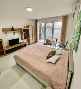 Voodi või voodid majutusasutuse Lake View Tašić toas
