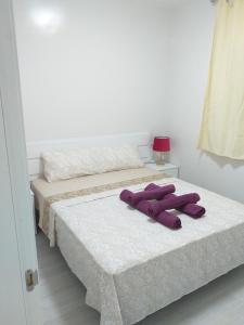 Postel nebo postele na pokoji v ubytování CASA PARAISO