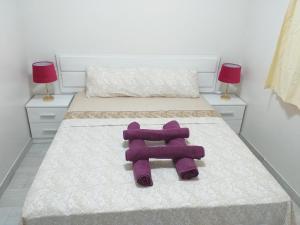 Postel nebo postele na pokoji v ubytování CASA PARAISO