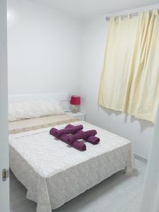 Postel nebo postele na pokoji v ubytování CASA PARAISO