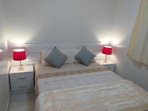 Postel nebo postele na pokoji v ubytování CASA PARAISO