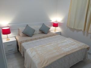 Postel nebo postele na pokoji v ubytování CASA PARAISO