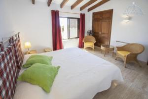 Łóżko lub łóżka w pokoju w obiekcie Villa Buen Lugar