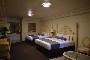 Voodi või voodid majutusasutuse Hotel Frontiere Tijuana toas