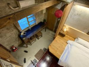Voodi või voodid majutusasutuse Yilan For A Night B&B toas