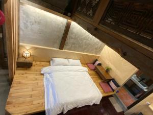 Voodi või voodid majutusasutuse Yilan For A Night B&B toas