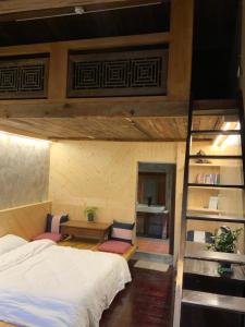 Voodi või voodid majutusasutuse Yilan For A Night B&B toas