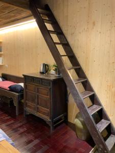 Voodi või voodid majutusasutuse Yilan For A Night B&B toas