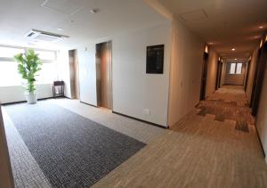 Televiisor ja/või meelelahutuskeskus majutusasutuses Urban Hotel Kyoto Gojo Premium