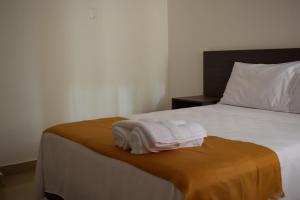 En eller flere senger på et rom på Mare S&M Casa Hostal