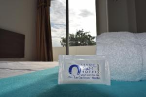 En eller flere senger på et rom på Mare S&M Casa Hostal