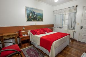 Ліжко або ліжка в номері Hotel Pousada Casa Tasca