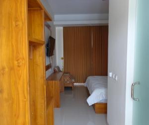 Rúm í herbergi á Diva Residence