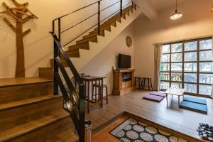 TV a/nebo společenská místnost v ubytování Forest B&B
