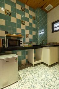 Kuchyň nebo kuchyňský kout v ubytování Forest B&B