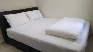 Axlite Hotel客房内的一张或多张床位