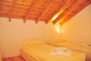Postel nebo postele na pokoji v ubytování Kleopatra Villas - Seaside Suites