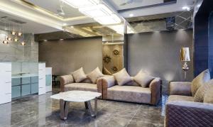 Posezení v ubytování Treebo Hotel A1