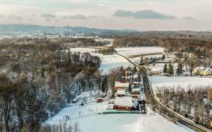an aerial view of a ski resort in the snow at Crab's Creek Zagreb in Rakov Potok +81 photos