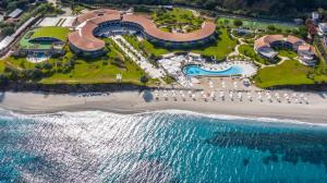 an aerial view of a resort next to the ocean at Capovaticano Resort Thalasso Spa in Capo Vaticano