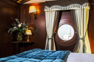 Uma cama ou camas num quarto em Hotel Bucintoro