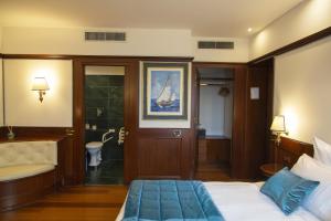 Uma cama ou camas num quarto em Hotel Bucintoro