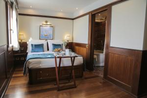 Uma cama ou camas num quarto em Hotel Bucintoro