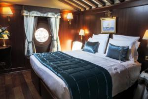 Uma cama ou camas num quarto em Hotel Bucintoro
