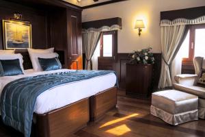 Uma cama ou camas num quarto em Hotel Bucintoro