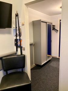TV a/nebo společenská místnost v ubytování Hotell Höga Kusten