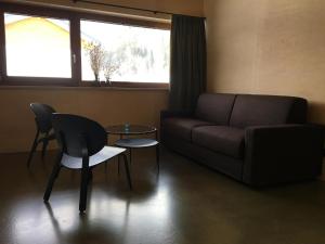 Posezení v ubytování Apartment Hoamelig