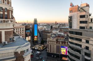 an aerial view of a city with buildings at Gran View Apartments in Madrid