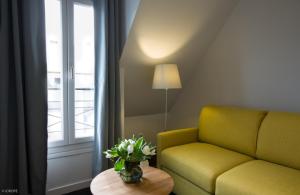 Posezení v ubytování Hotel Mirabeau Eiffel