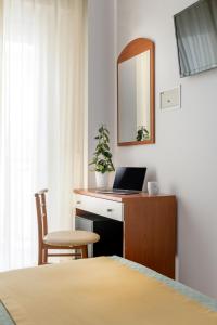 TV a/nebo společenská místnost v ubytování Hotel Principe