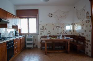 Cucina o angolo cottura di Calypso Appartamento