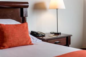 Voodi või voodid majutusasutuse Hotel Alvalade toas