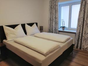 Postel nebo postele na pokoji v ubytování Appartement Tauernlife + 23 fotografií