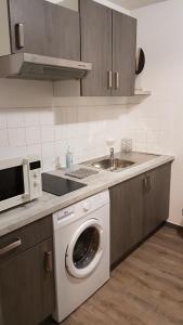 A kitchen or kitchenette at Appartement centre ville