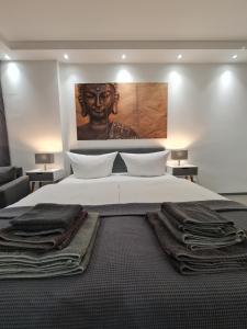 Ένα ή περισσότερα κρεβάτια σε δωμάτιο στο check-inn hotels - Essen